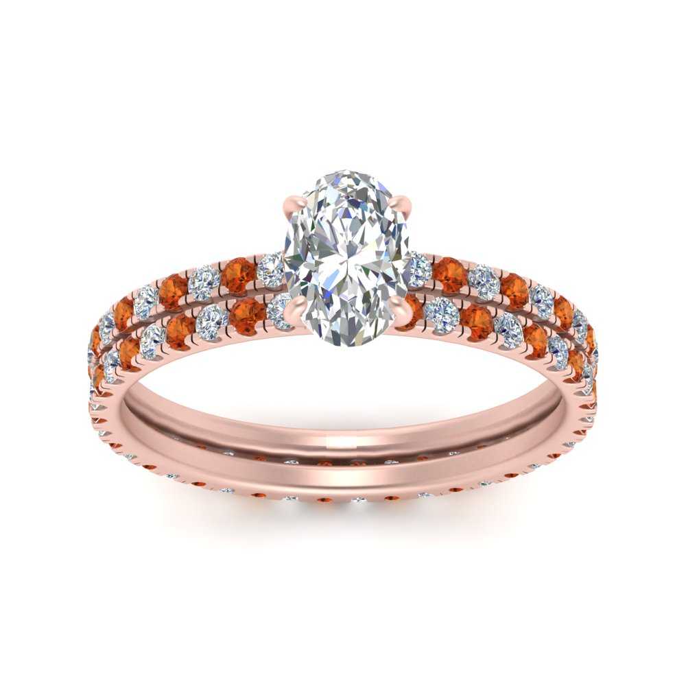 underhalo-eternity-oval-shaped-diamond-wedding-band-set-with-orange-sapphire-in-FD9168OVGSAORANGLE3-NL-RG