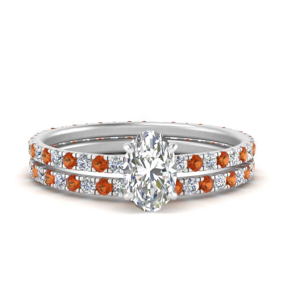 underhalo-eternity-oval-shaped-diamond-wedding-band-set-with-orange-sapphire-in-FD9168OVGSAORANGLE3-NL-WG