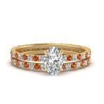 Load image into Gallery viewer, underhalo-eternity-oval-shaped-diamond-wedding-band-set-with-orange-sapphire-in-FD9168OVGSAORANGLE3-NL-YG

