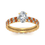 Load image into Gallery viewer, underhalo-eternity-oval-shaped-diamond-wedding-band-set-with-orange-sapphire-in-FD9168OVGSAORANGLE3-NL-YG
