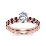 Load image into Gallery viewer, underhalo-eternity-oval-shaped-diamond-wedding-band-set-with-ruby-in-FD9168OVGRUDRANGLE3-NL-RG
