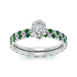Load image into Gallery viewer, underhalo-eternity-pear-shaped-diamond-wedding-band-set-with-emerald-in-FD9168PEGEMGRANGLE3-NL-WG

