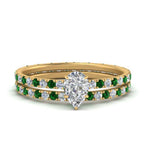 Load image into Gallery viewer, underhalo-eternity-pear-shaped-diamond-wedding-band-set-with-emerald-in-FD9168PEGEMGRANGLE3-NL-YG
