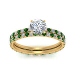 Load image into Gallery viewer, underhalo-eternity-round-cut-diamond-wedding-band-set-with-emerald-in-FD9168ROGEMGRANGLE3-NL-YG
