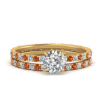 Load image into Gallery viewer, underhalo-eternity-round-cut-diamond-wedding-band-set-with-orange-sapphire-in-FD9168ROGSAORANGLE3-NL-YG
