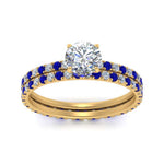 Load image into Gallery viewer, underhalo-eternity-round-cut-diamond-wedding-band-set-with-sapphire-in-FD9168ROGSABLANGLE3-NL-YG
