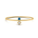 Load image into Gallery viewer, vertical-blue-topaz-round-and-princess-stacking-ring-in-yellow-gold-FD9397RORGICBLTO-NL-YG.jpg
