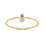 Load image into Gallery viewer, vertical-blue-topaz-round-and-princess-stacking-ring-in-yellow-gold-FD9397RORGICBLTO-NL-YG.jpg
