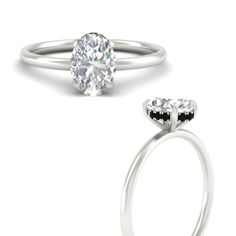 whisper-thin-setting-hidden-black-diamond-oval-shaped-halo-engagement-ring-in-white-gold-fdenr9359ovgblackangle3-nl-wg.jpg