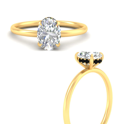 whisper-thin-setting-hidden-black-diamond-oval-shaped-halo-engagement-ring-in-yellow-gold-fdenr9359ovgblackangle3-nl-yg.jpg