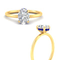 Thumbnail 62 - whisper-thin-setting-hidden-sapphire-oval-shaped-halo-engagement-ring-in-yellow-gold-fdenr9359ovgsablangle3-nl-yg.jpg