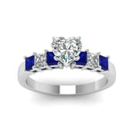 Load image into Gallery viewer, white-gold-heart-white-diamond-engagement-wedding-ring-with-blue-sapphire-in-prong-set-FDENS1027HTRGSABLANGLE5-NL-WG_dab8be8b-06cb-4c33-bb0b-7c8fb89e73ed
