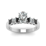 Load image into Gallery viewer, white-gold-oval-white-diamond-engagement-wedding-ring-with-black-diamond-in-prong-set-FDENS1027OVRGBLACKANGLE5-NL-WG_a488ac9c-6616-4c7c-aac6-13879cd202a8
