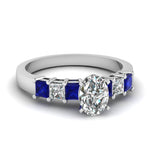 Load image into Gallery viewer, white-gold-oval-white-diamond-engagement-wedding-ring-with-blue-sapphire-in-prong-set-FDENS1027OVRGSABL-NL-WG_8c93529c-c1e2-44f4-9df8-a93466948c82
