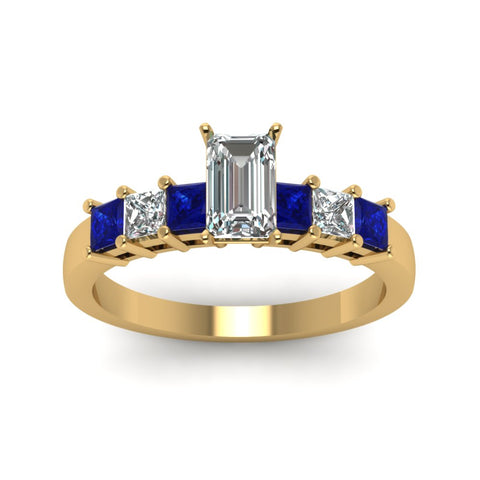 yellow-gold-emerald-white-diamond-engagement-wedding-ring-with-blue-sapphire-in-prong-set-FDENS1027EMRGSABLANGLE5-NL-YG_23524105-3cf8-4d7b-8bd9-5bda49f62476