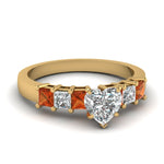 Load image into Gallery viewer, yellow-gold-heart-white-diamond-engagement-wedding-ring-with-orange-sapphire-in-prong-set-FDENS1027HTRGSAOR-NL-YG_31dec19b-8420-47fe-bf1f-d9dcb06932f4
