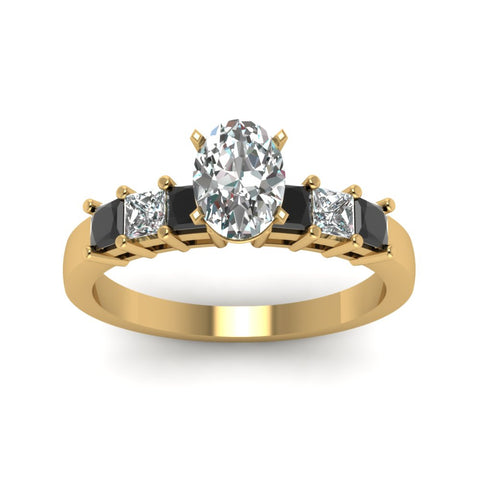 yellow-gold-oval-white-diamond-engagement-wedding-ring-with-black-diamond-in-prong-set-FDENS1027OVRGBLACKANGLE5-NL-YG_9544cc00-2317-4df3-a8cd-2b1f91230f6c