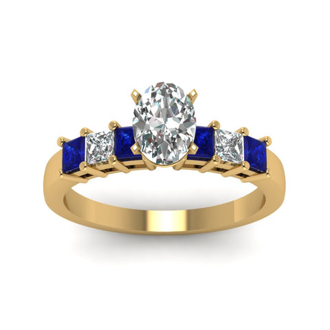 yellow-gold-oval-white-diamond-engagement-wedding-ring-with-blue-sapphire-in-prong-set-FDENS1027OVRGSABLANGLE5-NL-YG_b582f0a7-cfb2-49c5-bccb-d633377bd33b